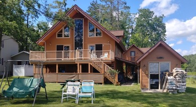 This unique home has incredible, beachfront on scenic Ess Lake - photo 7