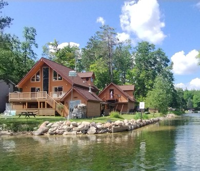This unique home has incredible, beachfront on scenic Ess Lake - photo 10