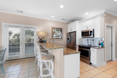 Welcome to Atlantic Harbour J-1, an updated end-unit condo with - photo 4