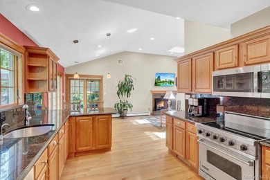 Welcome to this beautifully expanded ranch nestled in one of the - photo 11