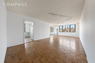 Welcome home to your light-filled corner residence at 201 East - photo 3
