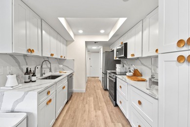 Step into this exquisitely reimagined condo in the prestigious - photo 21