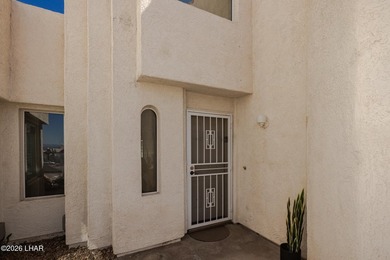Located in a highly desired golf course complex, this - photo 3