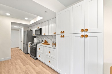 Step into this exquisitely reimagined condo in the prestigious - photo 23