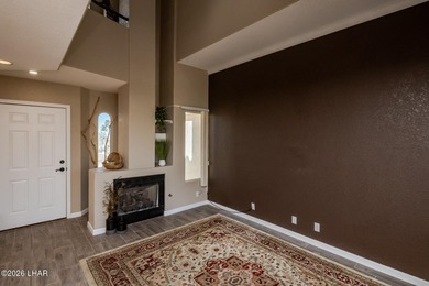 Located in a highly desired golf course complex, this - photo 4