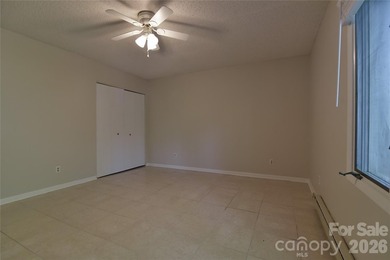 Enjoy low maintenance living and a prime location! Spacious - photo 26