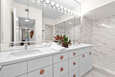 Step into this exquisitely reimagined condo in the prestigious - photo 28
