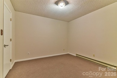 Enjoy low maintenance living and a prime location! Spacious - photo 29