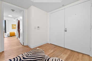 Step into this exquisitely reimagined condo in the prestigious - photo 32