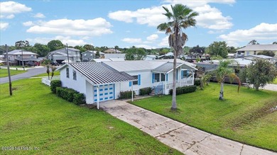 Located in the waterfront community of Sportsman Harbor in - photo 3