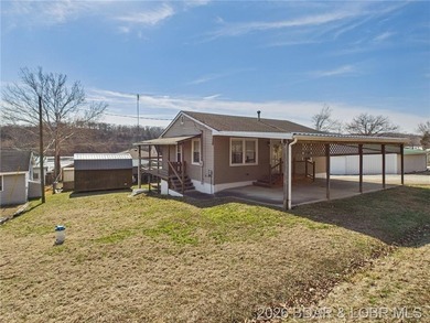 2-bedroom, 1.5 bath home situated on a level 0.13-acre lot with - photo 31