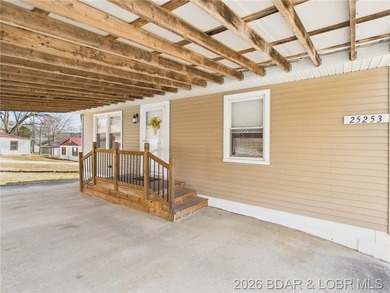2-bedroom, 1.5 bath home situated on a level 0.13-acre lot with - photo 32