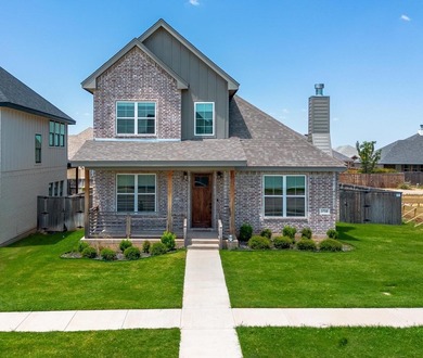 Welcome to this stunning custom home in the highly sought-after - photo 1