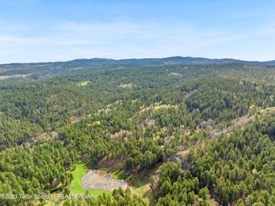 The 2,238 deeded acre ranch is located about 8 miles NW of - photo 11
