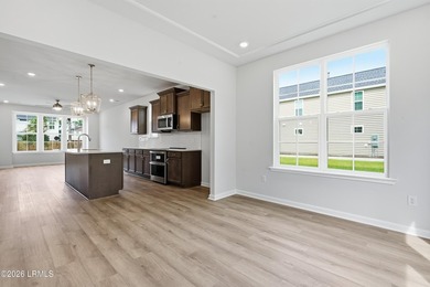 This two-story home includes three bedrooms and two and one-half - photo 12