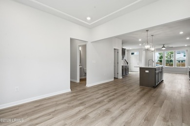 This two-story home includes three bedrooms and two and one-half - photo 13