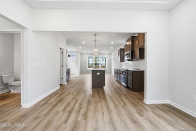 This two-story home includes three bedrooms and two and one-half - photo 14