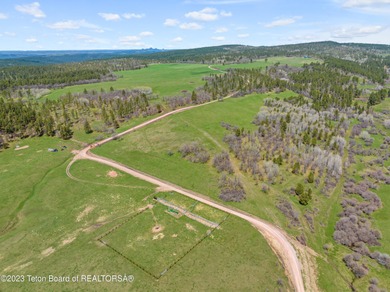 The 2,238 deeded acre ranch is located about 8 miles NW of - photo 16