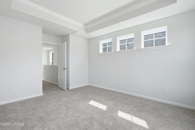 This two-story home includes three bedrooms and two and one-half - photo 17