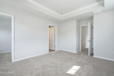 This two-story home includes three bedrooms and two and one-half - photo 18
