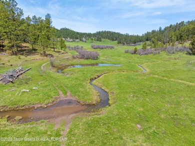 The 2,238 deeded acre ranch is located about 8 miles NW of - photo 18