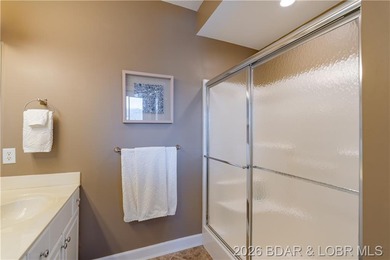 WALK-IN-NO STEPS LAKE LIVING! Experience effortless lakeside