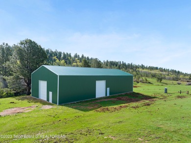 The 2,238 deeded acre ranch is located about 8 miles NW of - photo 20