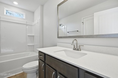 This two-story home includes three bedrooms and two and one-half - photo 21
