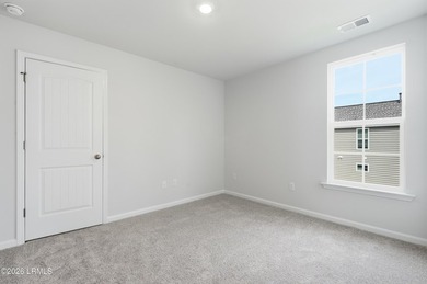 This two-story home includes three bedrooms and two and one-half - photo 22