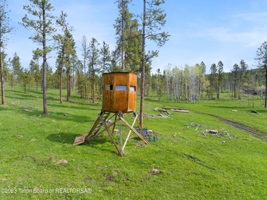 The 2,238 deeded acre ranch is located about 8 miles NW of - photo 22