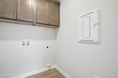This two-story home includes three bedrooms and two and one-half - photo 23