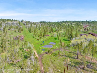 The 2,238 deeded acre ranch is located about 8 miles NW of - photo 24