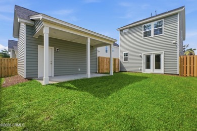 This two-story home includes three bedrooms and two and one-half - photo 25
