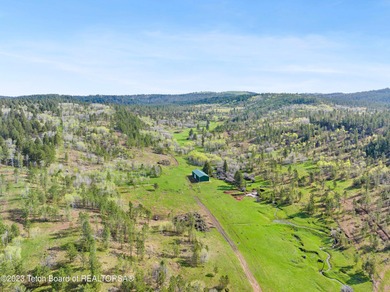The 2,238 deeded acre ranch is located about 8 miles NW of - photo 32