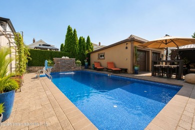 Welcome to this exceptional detached two-family residence where - photo 12