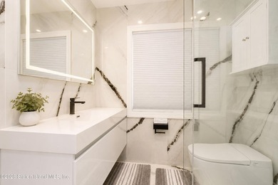 Welcome to this exceptional detached two-family residence where - photo 19