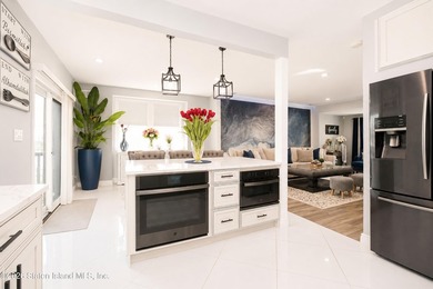 Welcome to this exceptional detached two-family residence where - photo 31