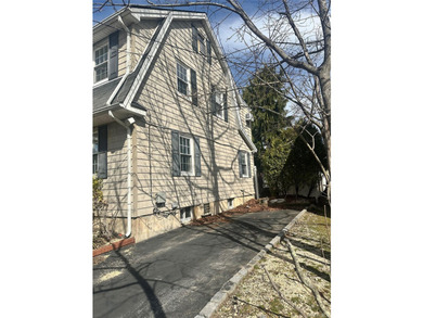 Discover this charming Colonial home located in Woodmere, ready - photo 4