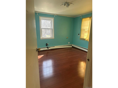 Discover this charming Colonial home located in Woodmere, ready - photo 5
