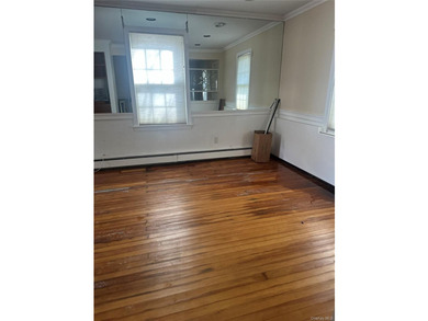 Discover this charming Colonial home located in Woodmere, ready - photo 7