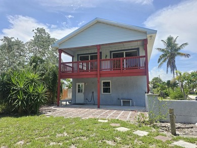 NO HOA. Just two blocks from the Atlantic Ocean. This three - photo 2