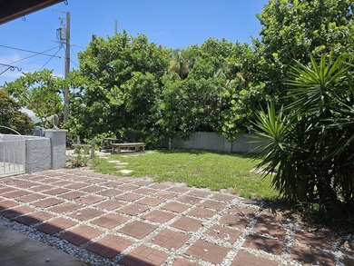 NO HOA. Just two blocks from the Atlantic Ocean. This three - photo 4