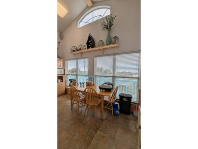 Relaxed coastal charm awaits in this 2-bedroom, 2-bath home on - photo 9