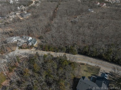 Flat 0.4-acre lot located in Four Seasons POA, offering an - photo 11