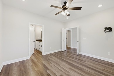 Welcome to 401 Grand Harbor Boulevard, the almost new home is - photo 8