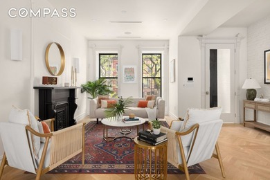 This meticulously renovated single-family home offers five - photo 3