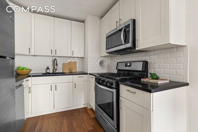 Rare Bushwick Gem: 2-Family Townhouse with Private Parking & - photo 4