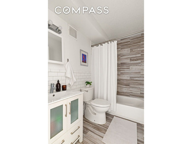 Rare Bushwick Gem: 2-Family Townhouse with Private Parking & - photo 5