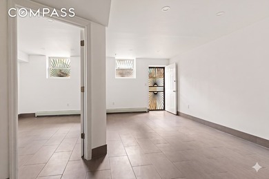 Rare Bushwick Gem: 2-Family Townhouse with Private Parking & - photo 10