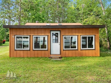 Tucked along 50 feet of coveted West Twin Lake frontage, this - photo 6